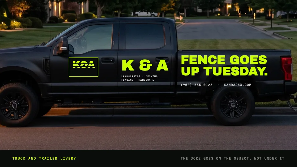 K & A truck and trailer livery on a street at dusk
